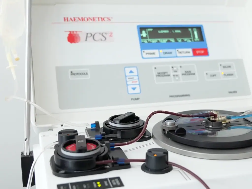 Apheresis equipment prepared for a procedure in the site's procedure room.
