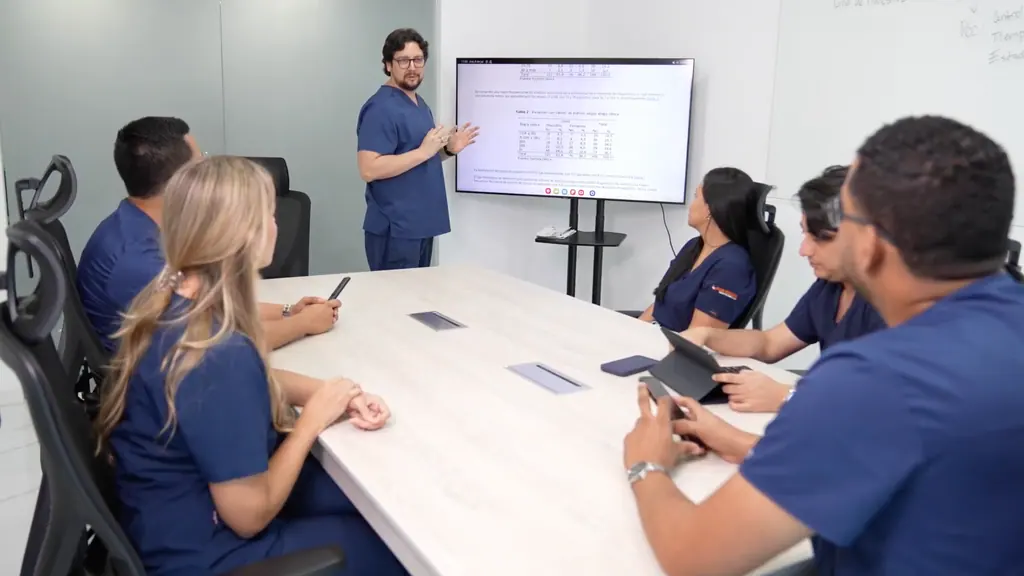 Members of the Allied research team reviewing study data in the site's meeting room.